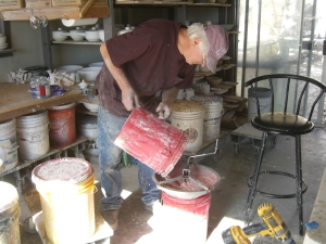 John mixing glazes